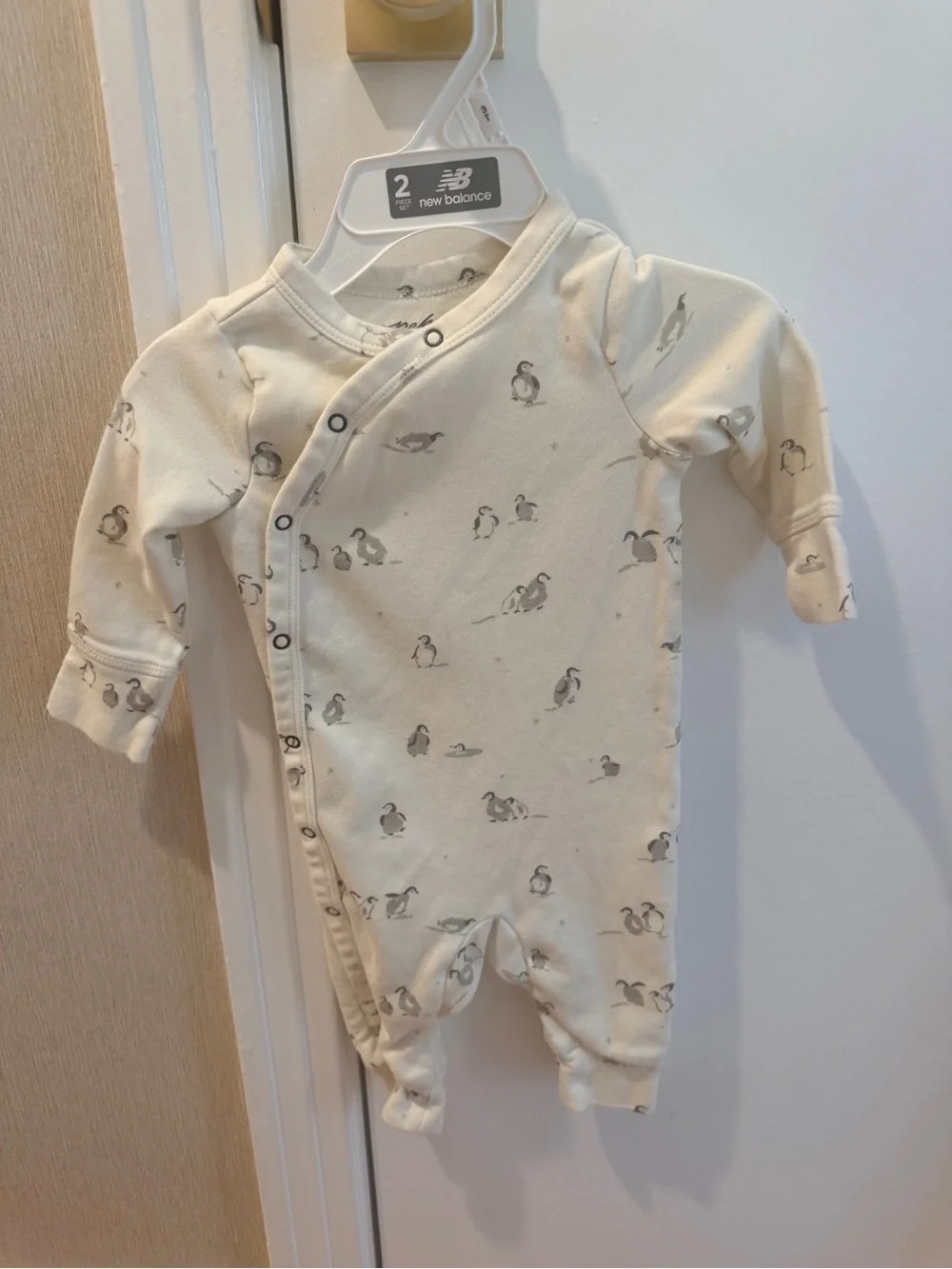 New Balance Cream Penguin-Print One-Piece Bodysuit